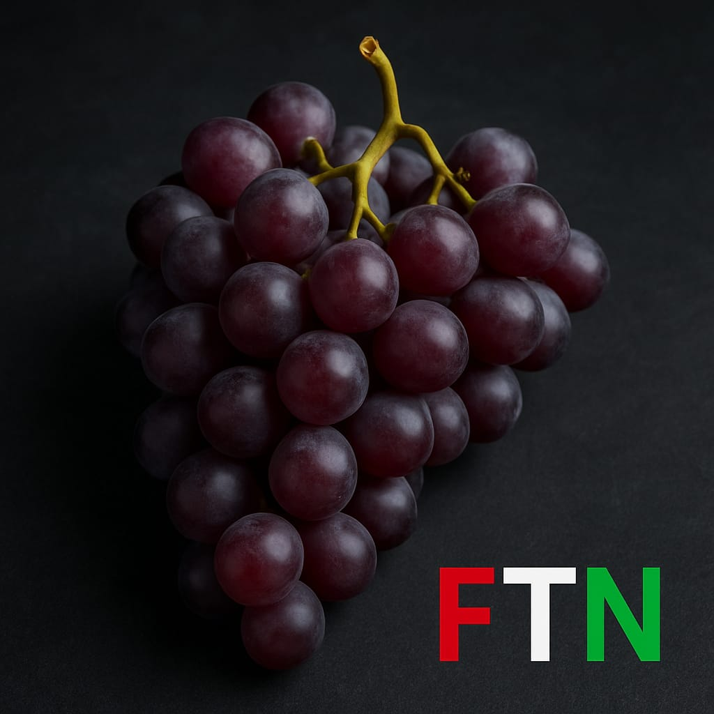 Fresh grapes on a dark background with FTN logo — F in red, T in white, and N in green — packed with antioxidants and natural sugars for athletic endurance.